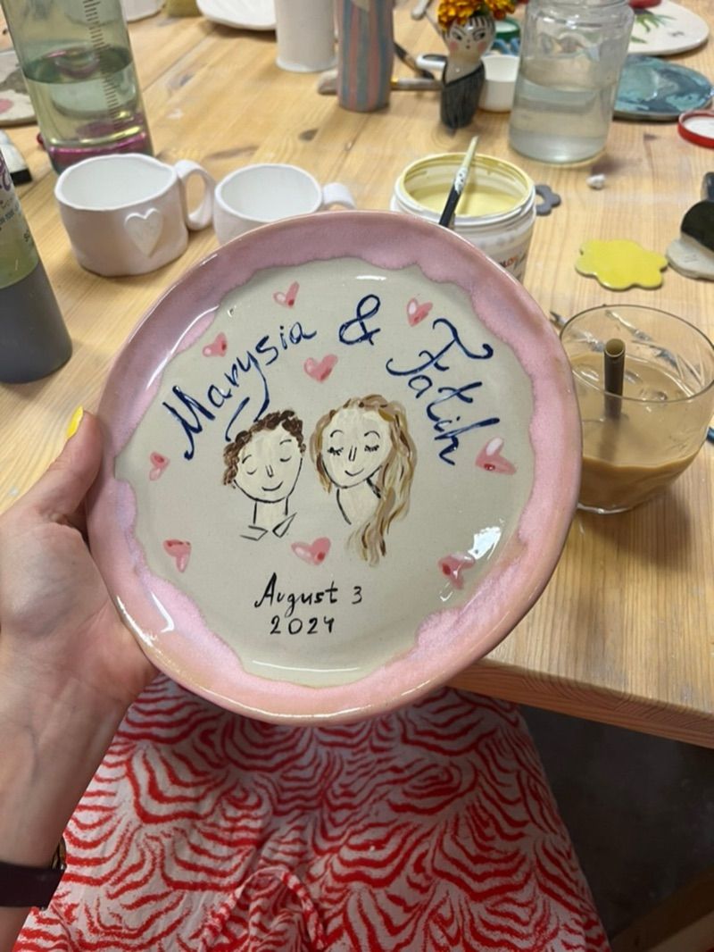 Hand-painted pink plate with couple portrait