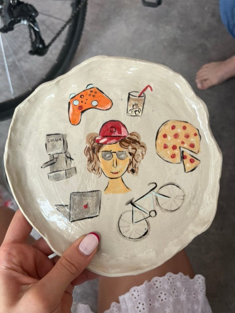 Illustrated portrait plate with hobbies