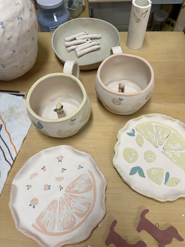 Unfired citrus plates and mugs